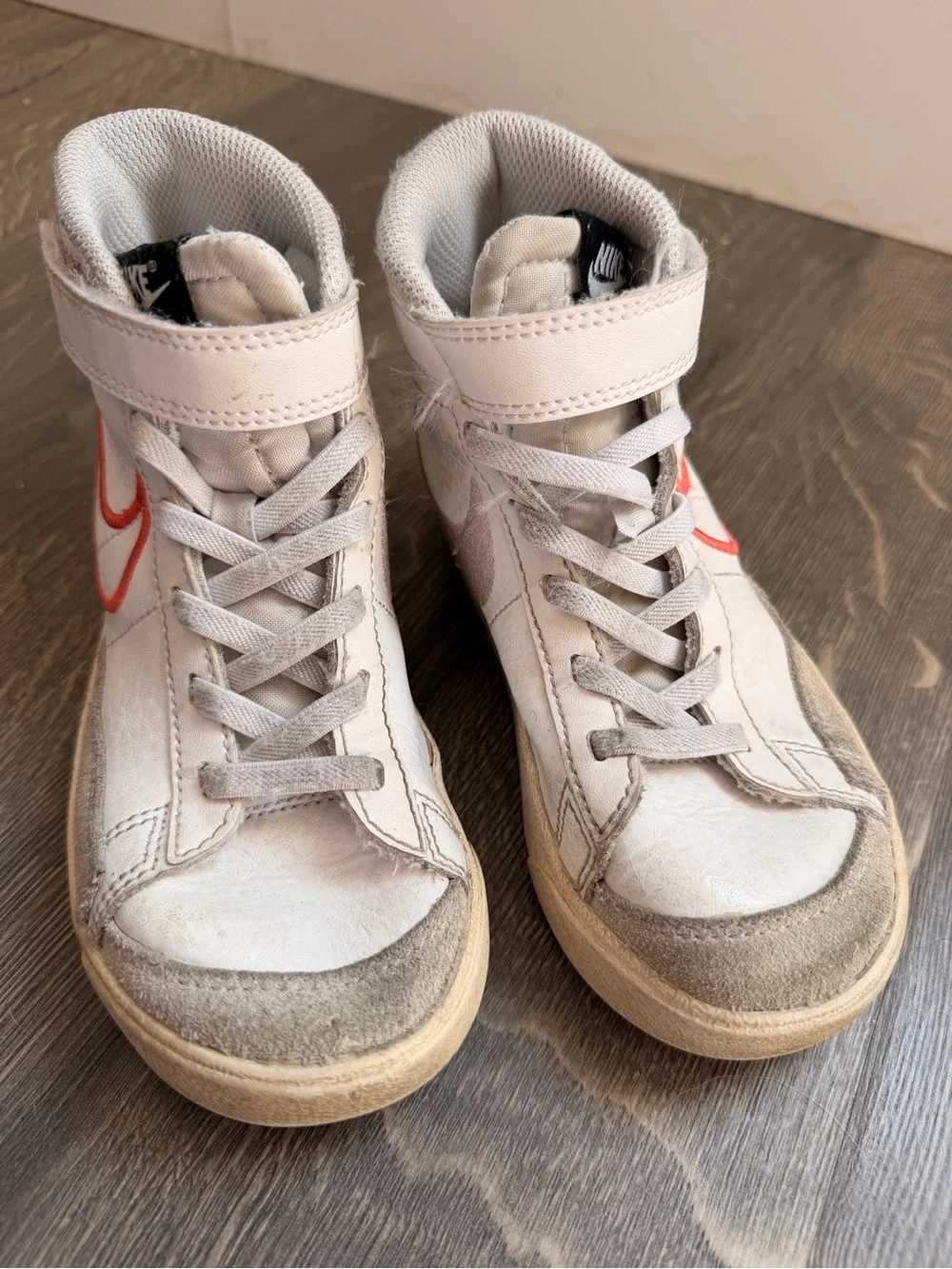 Nike Kids White High-Top Sneakers with Coral Swoosh Accent